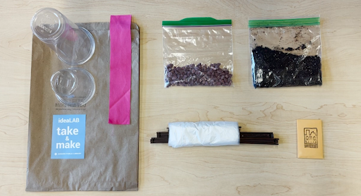 idealab take & make kit including seeds, soil, plastic cups, paper bag, plastic wrap, and other miscellaneous materials