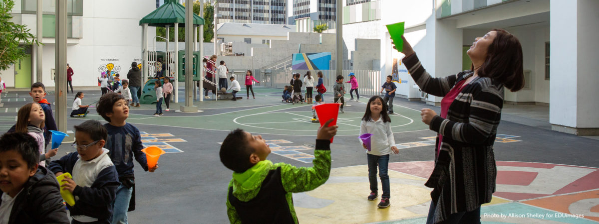 Elementary students play outside