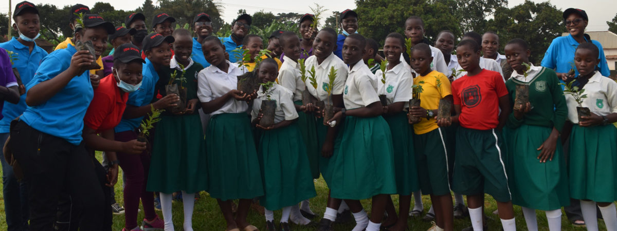A student group from Uganda displays their plants