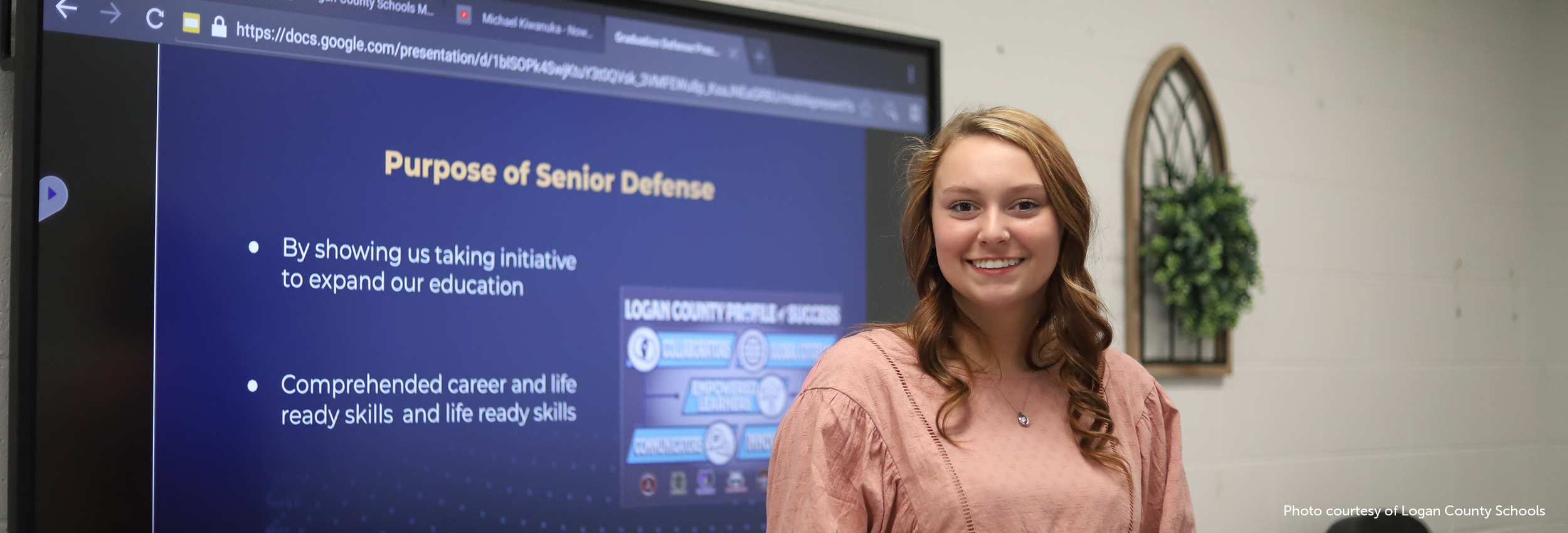 Logan County High School student presenting her Senior Defense