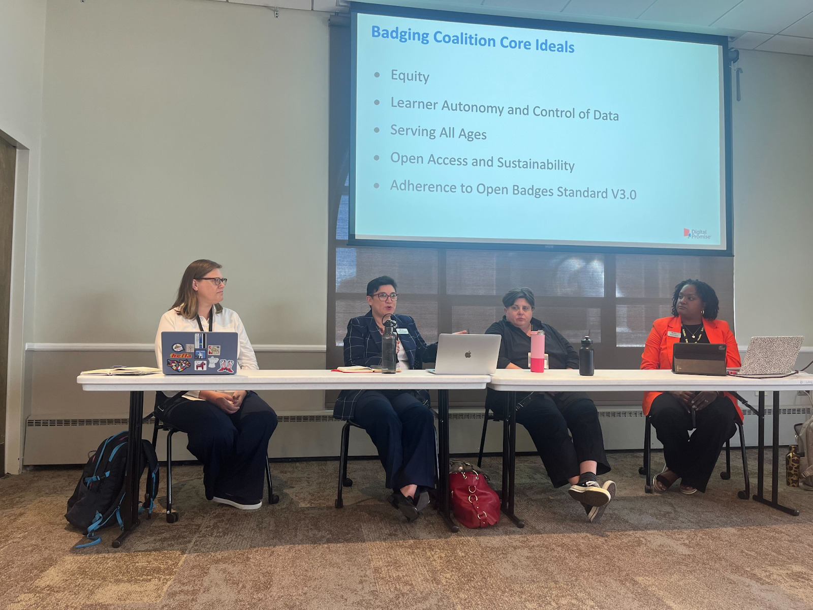 Kristen Franklin, Rita Fennelly-Atkinson, Kerri Lemoie, and Nichole Aguirre during their session, “Supporting Open Source, Open-Badge Credentials.”