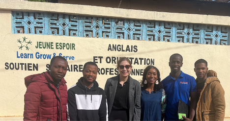 April, Aissata, and other Jeune Espoir staff members gather in Dalaba, Guinea to collaborate on the development and delivery of professional development activities for local educators. 