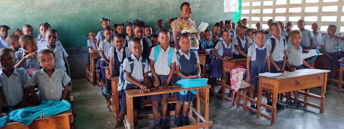 Group of students and their teacher in a classroom