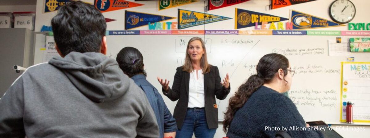 A teacher kicks off a lesson during an AP research class.