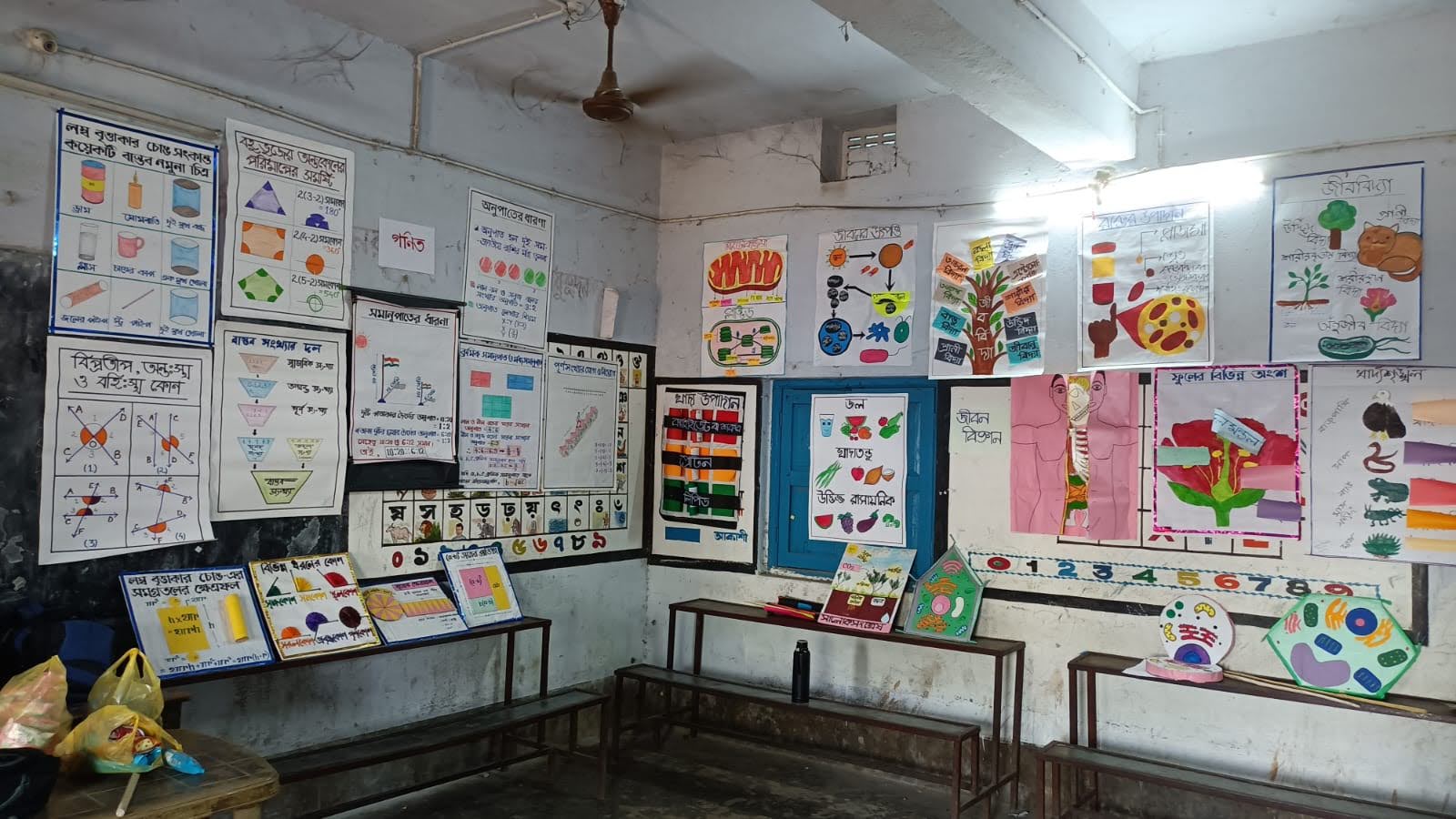 A wall of posters designed by students