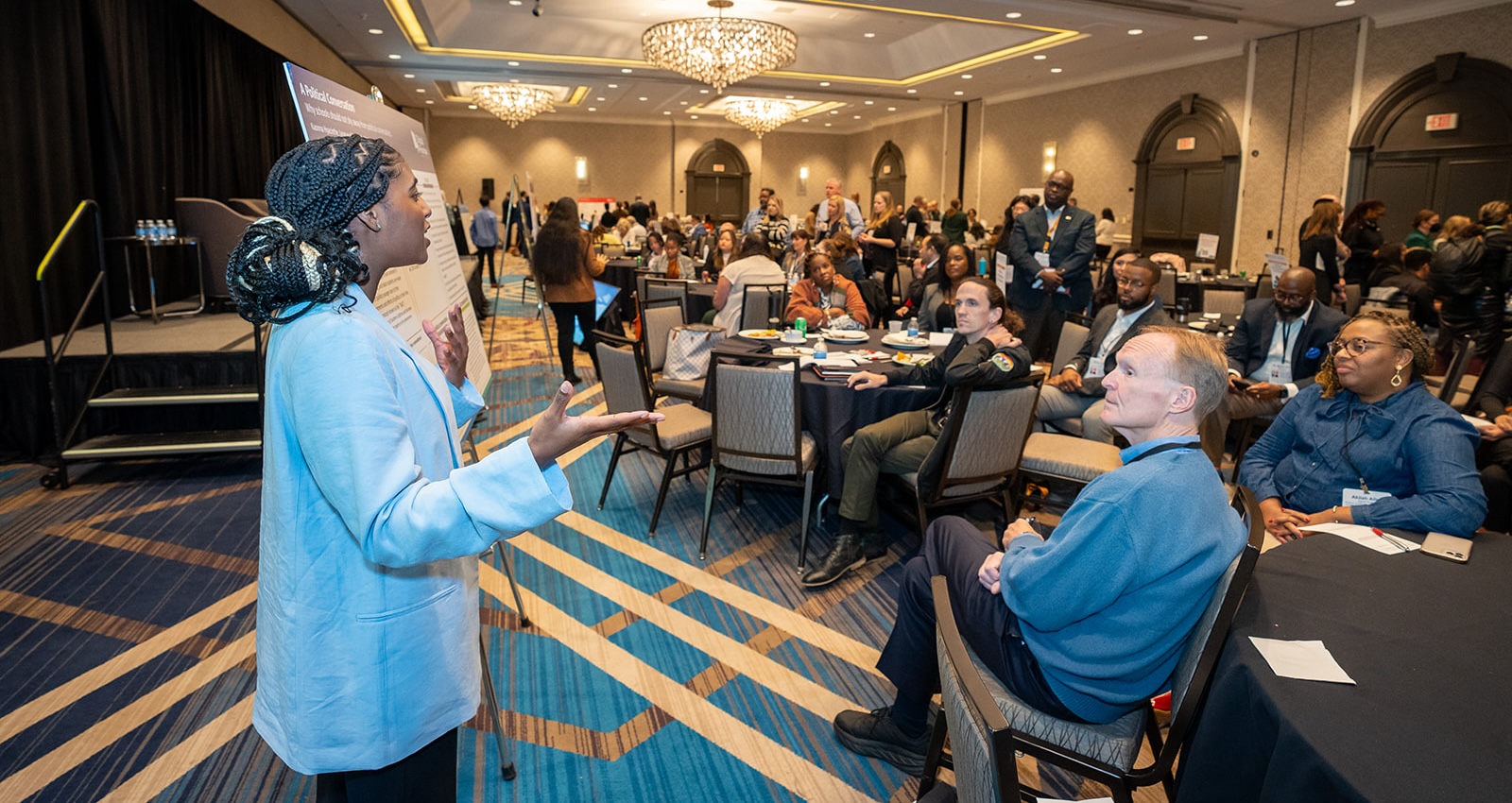 A photo of a LOIS student speaking at the 2023 CII Convening.