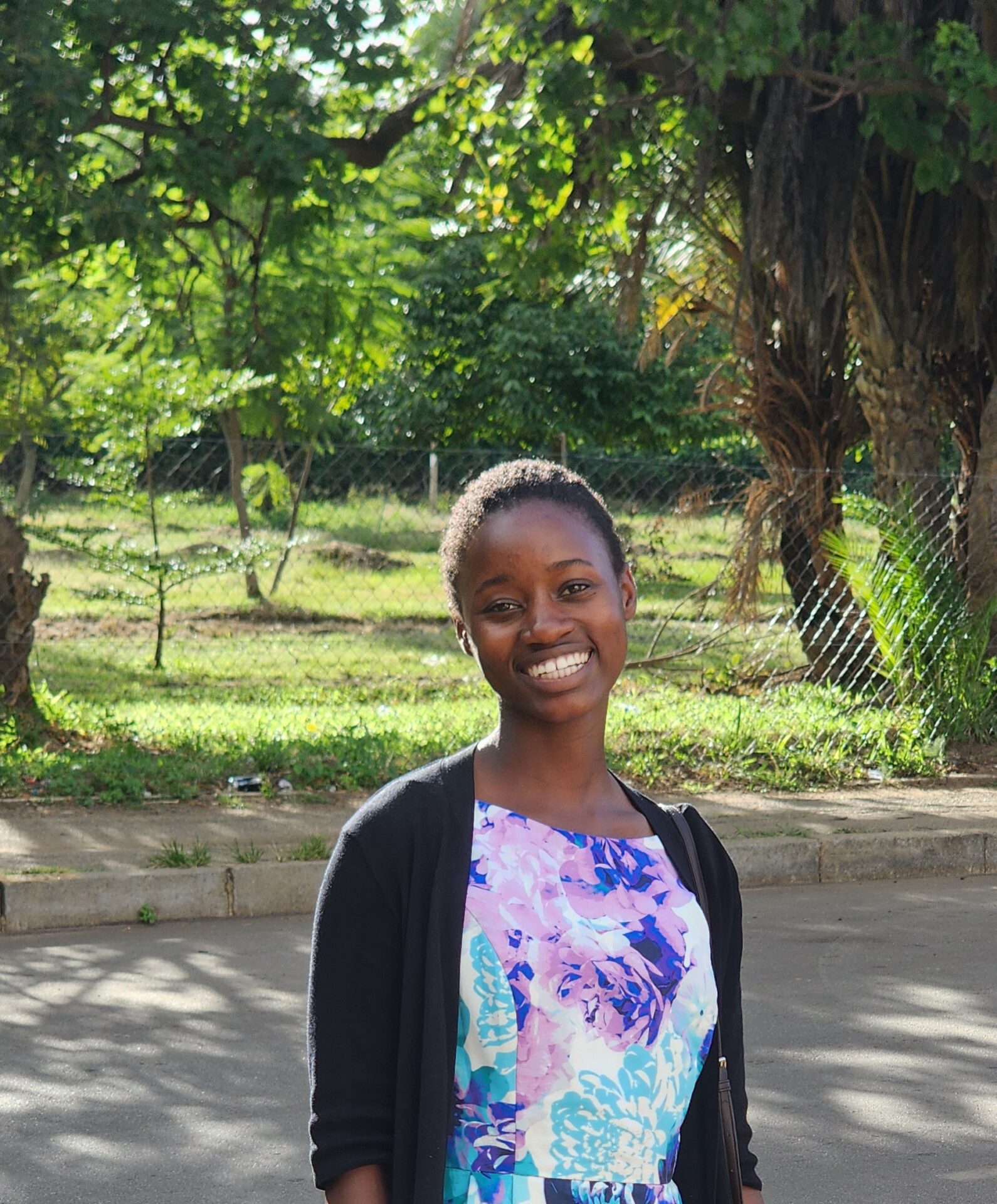 Vanessa smiles at the camera.